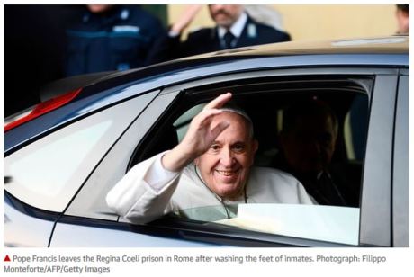 Francis washing feet of inmates